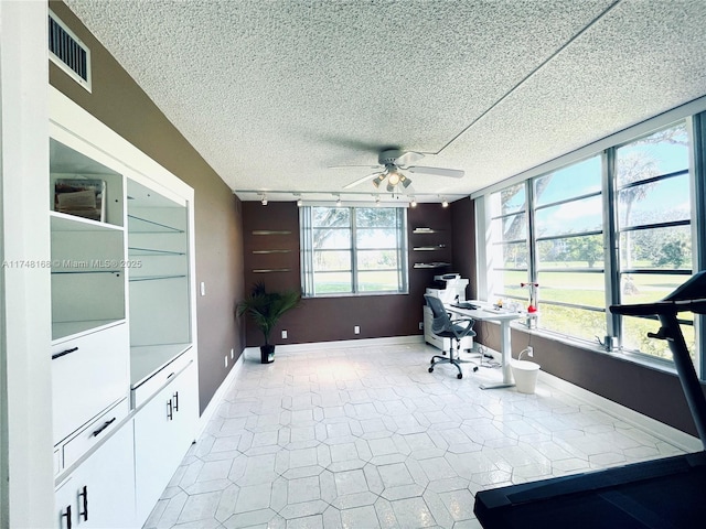 3800 Oaks Clubhouse Dr Unit 112, Pompano Beach, FL 33069 - office space featuring ceiling fan, baseboards, a textured ceiling, and light tile patterned floors