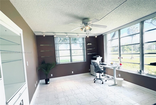 3800 Oaks Clubhouse Dr Unit 112, Pompano Beach, FL 33069 - office with track lighting, a ceiling fan, a textured ceiling, and baseboards