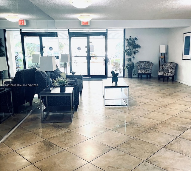 3800 Oaks Clubhouse Dr Unit 112, Pompano Beach, FL 33069 - common area featuring a textured ceiling