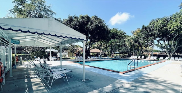 3800 Oaks Clubhouse Dr Unit 112, Pompano Beach, FL 33069 - community pool with a patio area and a gazebo