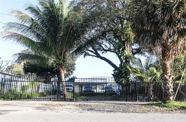 view of gate with fence