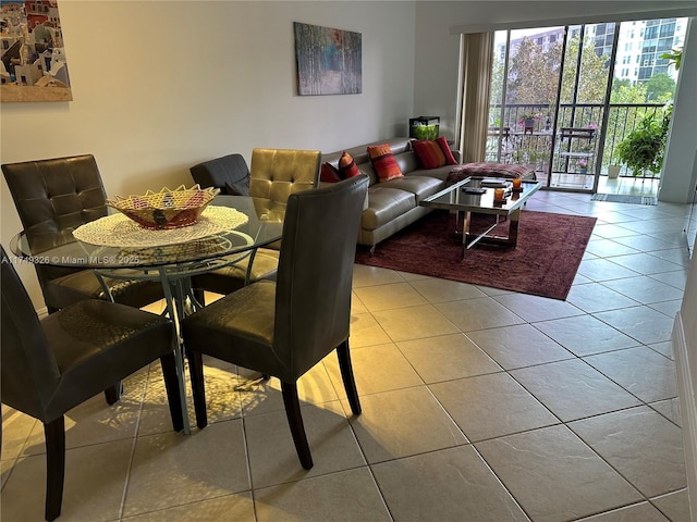 dining area with light tile patterned floors