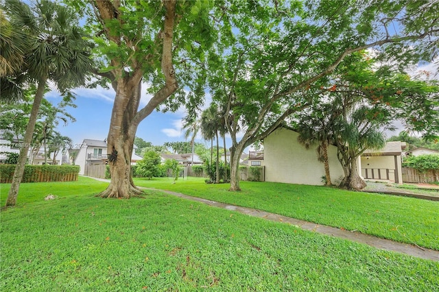 view of yard with fence and a residential view