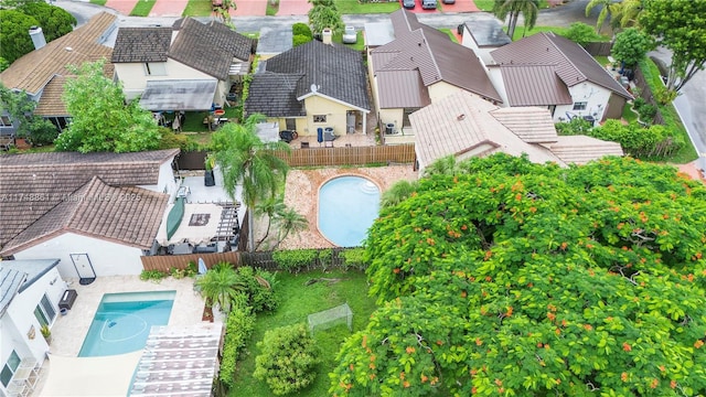 aerial view of residential area featuring a pool