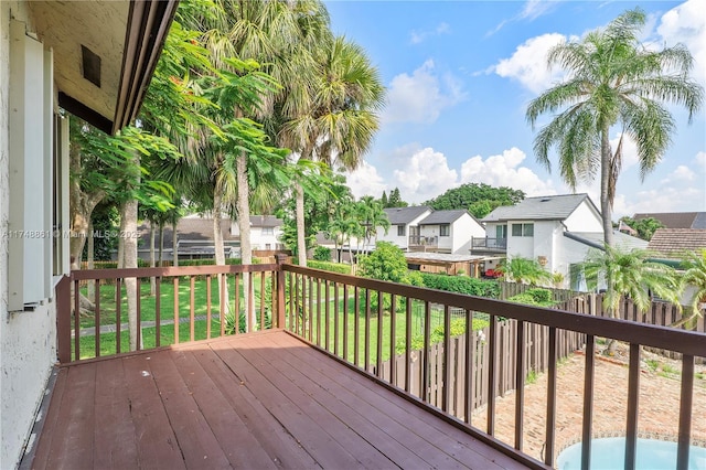 wooden deck featuring a residential view
