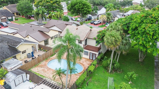 aerial perspective of suburban area with a pool area