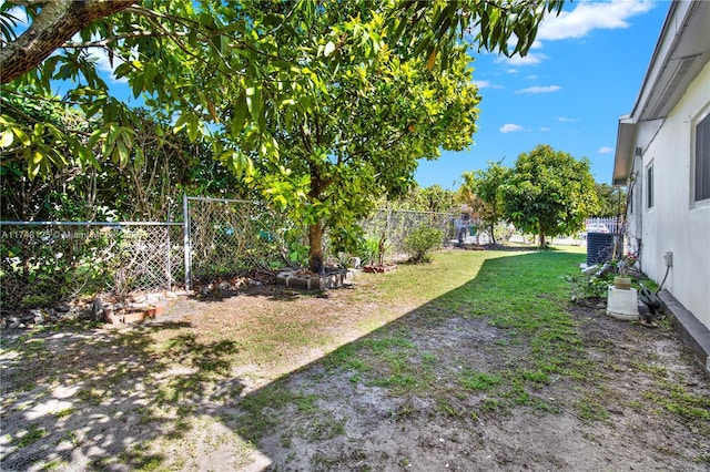 view of yard featuring cooling unit and a fenced backyard