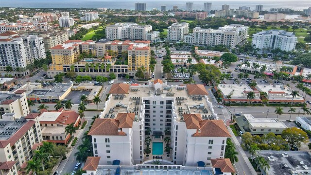 birds eye view of property with a view of city