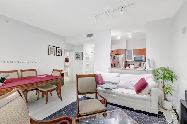 living room with visible vents