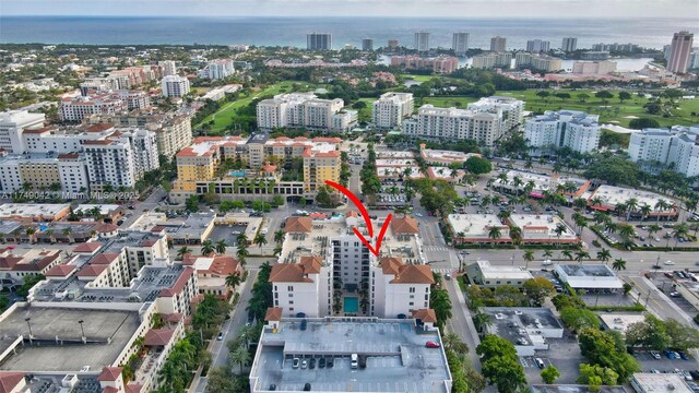 aerial view with a water view and a view of city