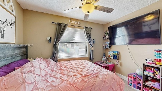 10927 NW 29th Ct, Sunrise, FL 33322 - bedroom featuring a textured ceiling, ceiling fan, and baseboards