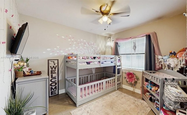 10927 NW 29th Ct, Sunrise, FL 33322 - bedroom featuring a ceiling fan, baseboards, and wood finished floors