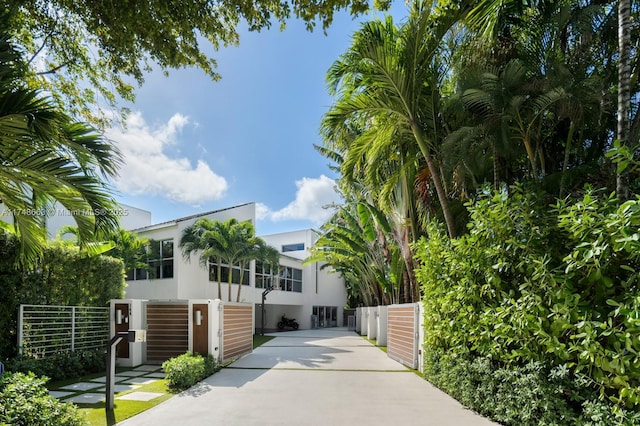 144 N Prospect Dr, Coral Gables, FL 33133 - view of front of home featuring stucco siding
