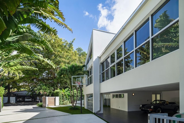 144 N Prospect Dr, Coral Gables, FL 33133 - view of side of home with stucco siding
