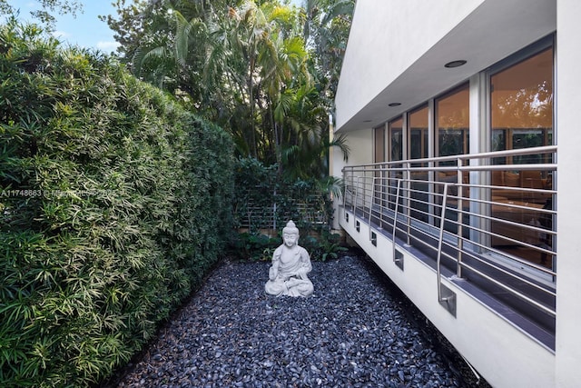144 N Prospect Dr, Coral Gables, FL 33133 - view of side of home featuring stucco siding