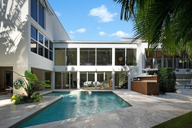144 N Prospect Dr, Coral Gables, FL 33133 - swimming pool featuring a patio area