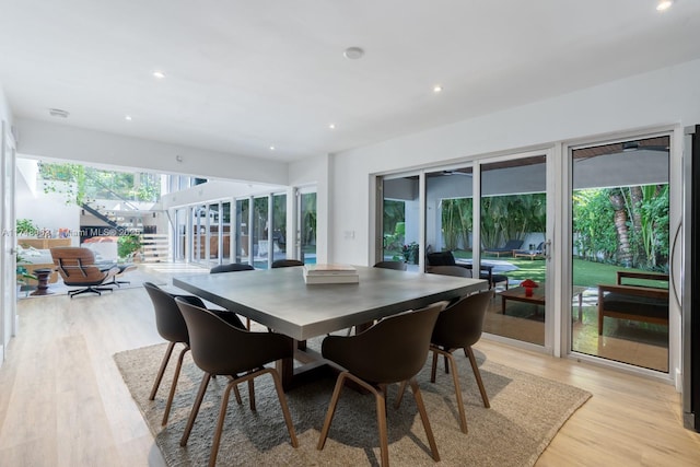 144 N Prospect Dr, Coral Gables, FL 33133 - dining space with recessed lighting and light wood-style floors