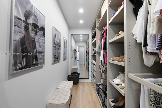 144 N Prospect Dr, Coral Gables, FL 33133 - walk in closet with light wood-type flooring