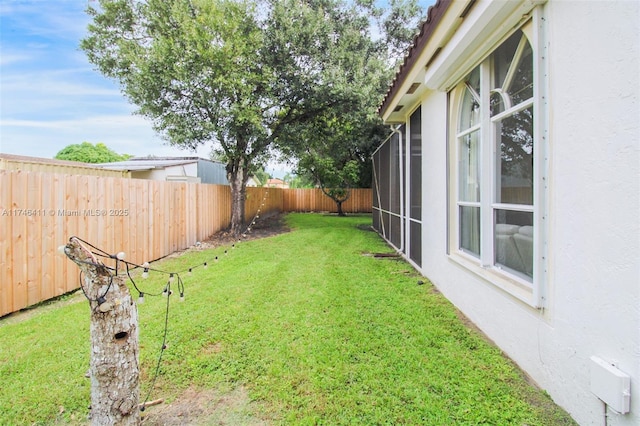 view of yard featuring a fenced backyard