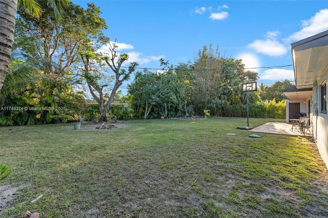 view of yard with a patio and fence