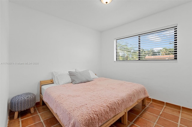 bedroom with tile patterned flooring