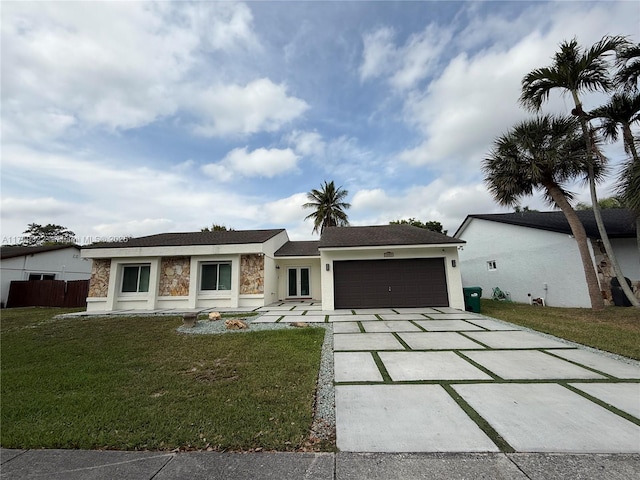 ranch-style house featuring stucco siding, a garage, stone siding, driveway, and a front lawn