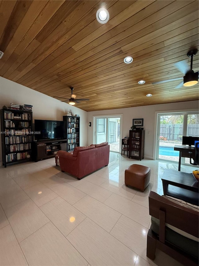 living room featuring wood ceiling, ceiling fan, and recessed lighting