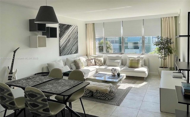 living area featuring light tile patterned floors