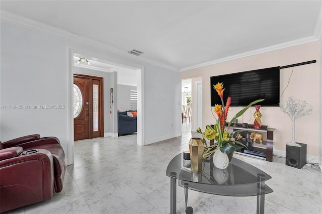 living room with marble finish floor, baseboards, and ornamental molding