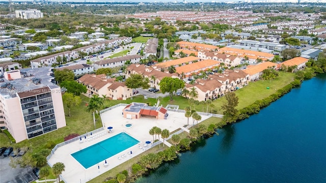 bird's eye view featuring a water view and a residential view