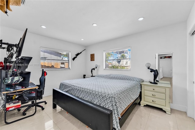 1820 N 27th Ave, Hollywood, FL 33020 - bedroom featuring light tile patterned floors, baseboards, multiple windows, and recessed lighting
