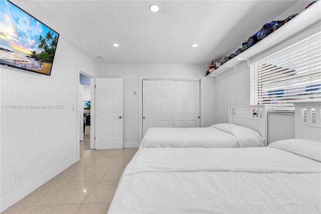 1820 N 27th Ave, Hollywood, FL 33020 - bedroom with baseboards, a closet, recessed lighting, and light tile patterned floors