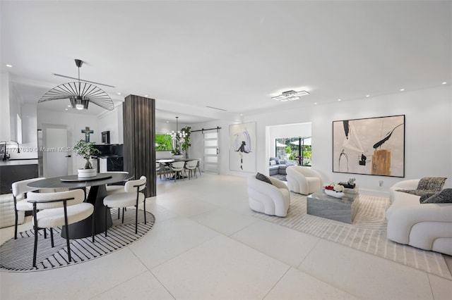 living room featuring recessed lighting, a barn door, and tile patterned flooring