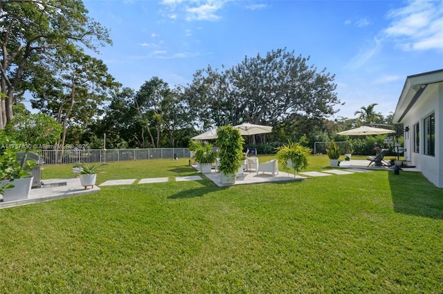 view of yard with a patio and fence