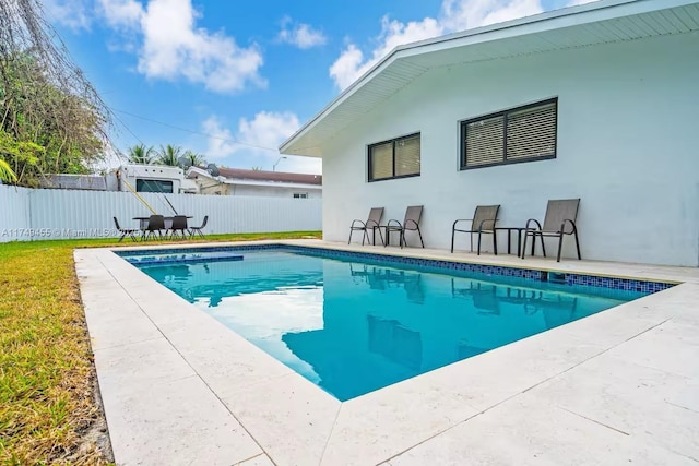 view of pool featuring a fenced in pool and a fenced backyard