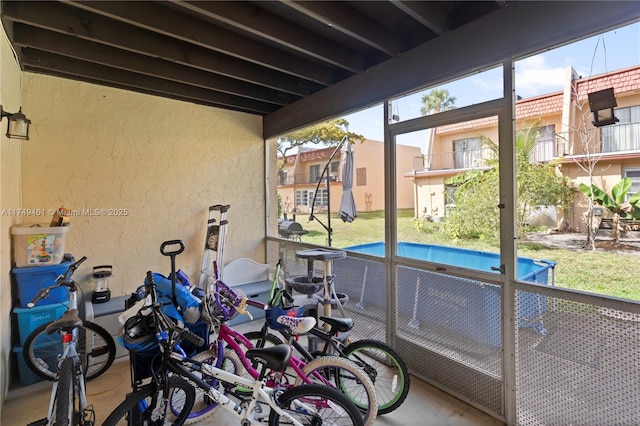 exercise room featuring a textured wall