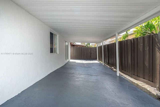 view of patio / terrace featuring fence