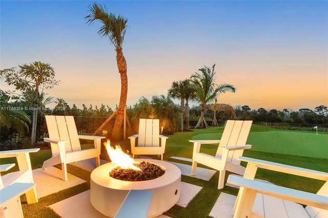 view of patio / terrace with an outdoor fire pit