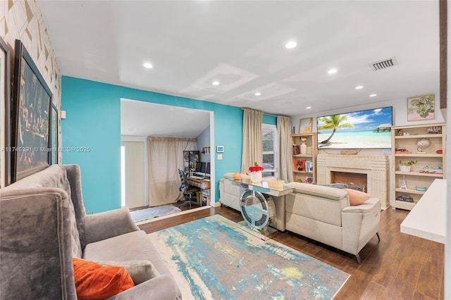 431 NE 110th Ter, Miami, FL 33161 - living area with hardwood / wood-style floors, a fireplace, and recessed lighting