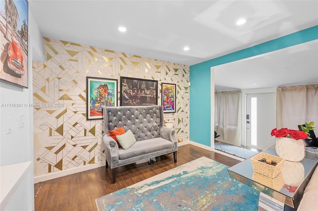 431 NE 110th Ter, Miami, FL 33161 - sitting room with an accent wall, recessed lighting, wood finished floors, and wallpapered walls