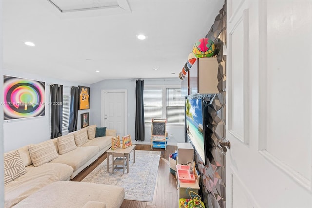 431 NE 110th Ter, Miami, FL 33161 - living room featuring wood finished floors, recessed lighting, and vaulted ceiling