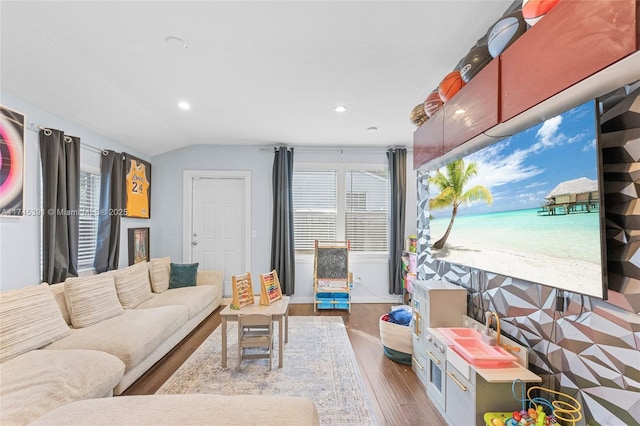 431 NE 110th Ter, Miami, FL 33161 - living area featuring wood finished floors, lofted ceiling, and recessed lighting