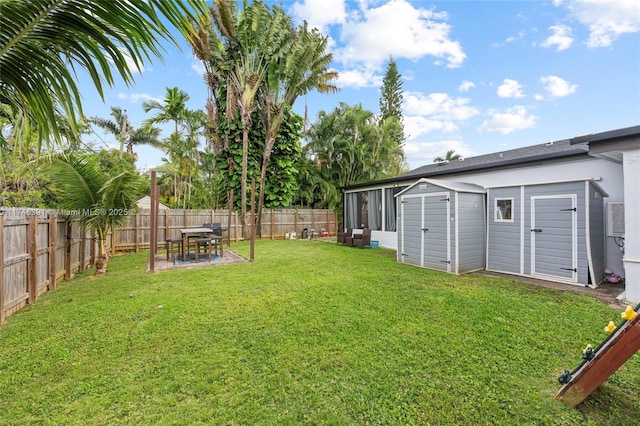431 NE 110th Ter, Miami, FL 33161 - fenced backyard with a storage unit and a patio