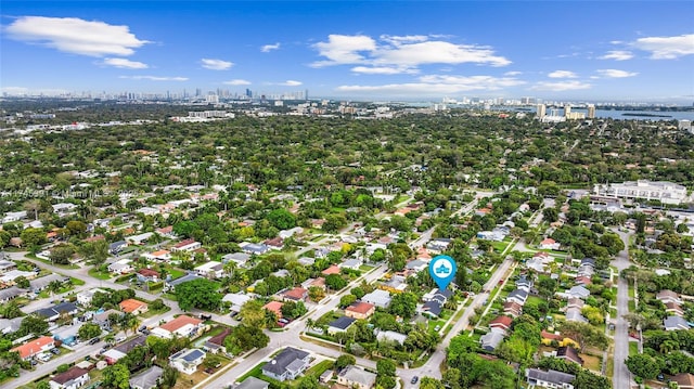431 NE 110th Ter, Miami, FL 33161 - aerial overview of property's location featuring city skyline and a large body of water
