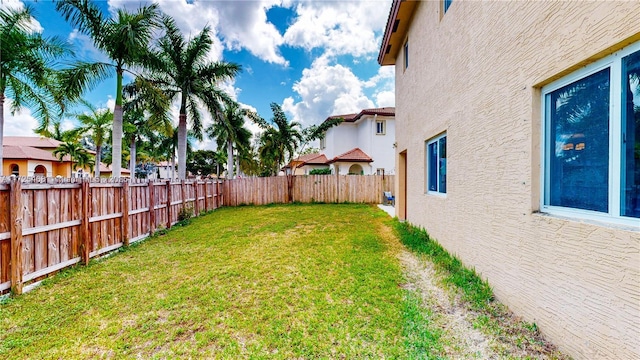 view of yard featuring a fenced backyard