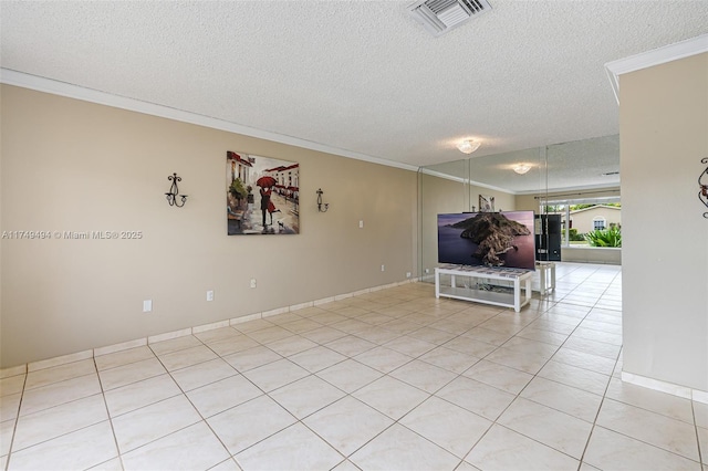 unfurnished living room featuring ornamental molding, visible vents, a textured ceiling, and light tile patterned floors