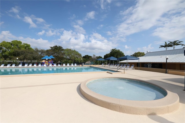 pool with a patio area