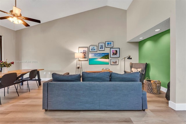 123 NW 98th Ter, Plantation, FL 33324 - living room with ceiling fan, high vaulted ceiling, light wood-style flooring, and baseboards