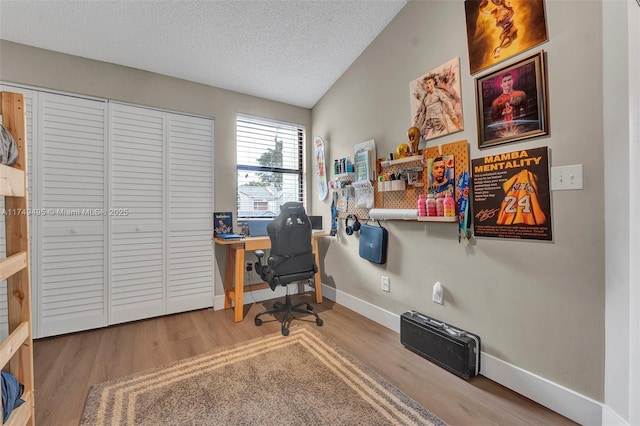 123 NW 98th Ter, Plantation, FL 33324 - office area featuring baseboards, a textured ceiling, and wood finished floors