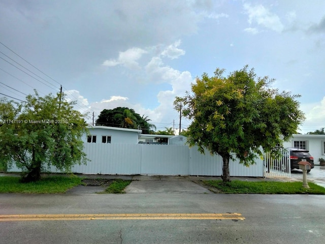 view of property exterior featuring fence